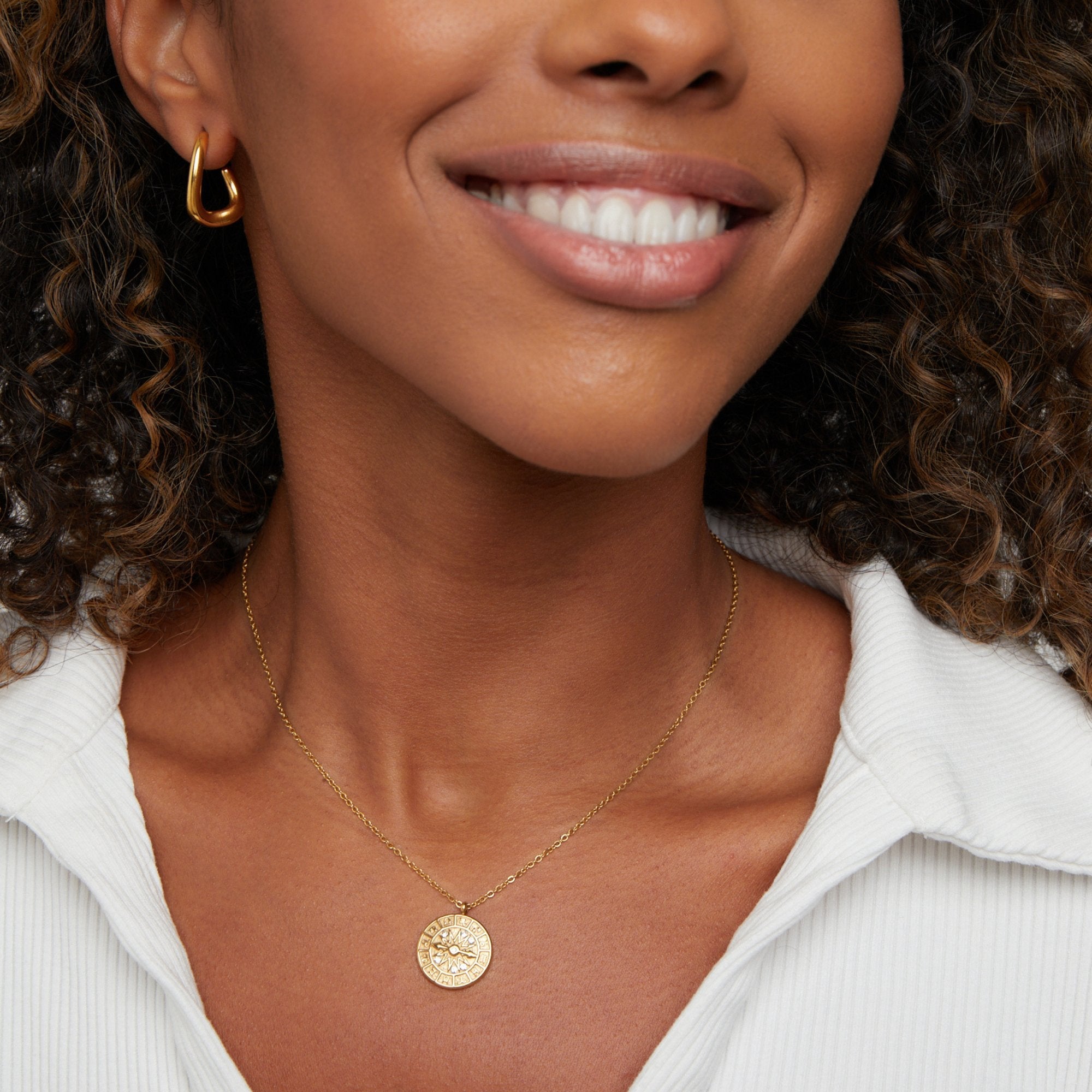 Colar de moeda do zodíaco